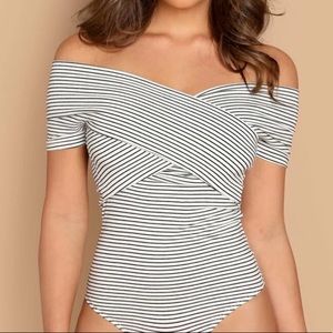 Wrap off the shoulder body suit.